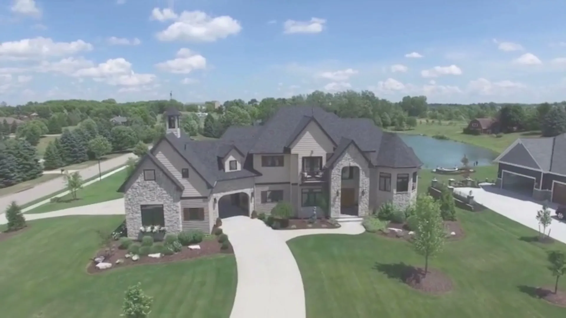 Aerial view of a custom home new construction in West Michigan