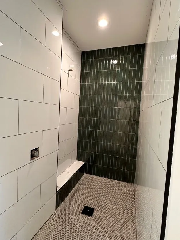 Bathroom remodel with a tiled walk-in shower in West Michigan